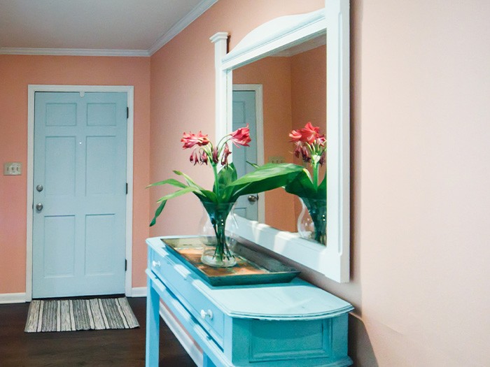 Entryway walls painted pink.